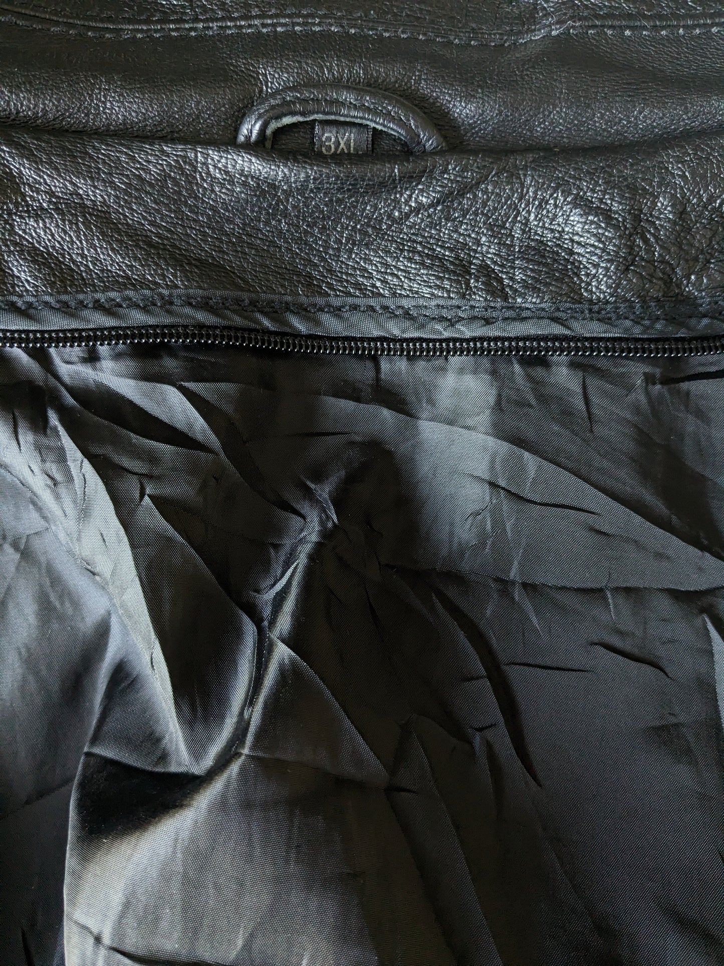 Vintage half -length leather jacket. Black colored. Size 3XL / XXXL.