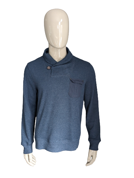 Suéter Burton con collar deportivo. Azul oscuro mezclado. Talla L.