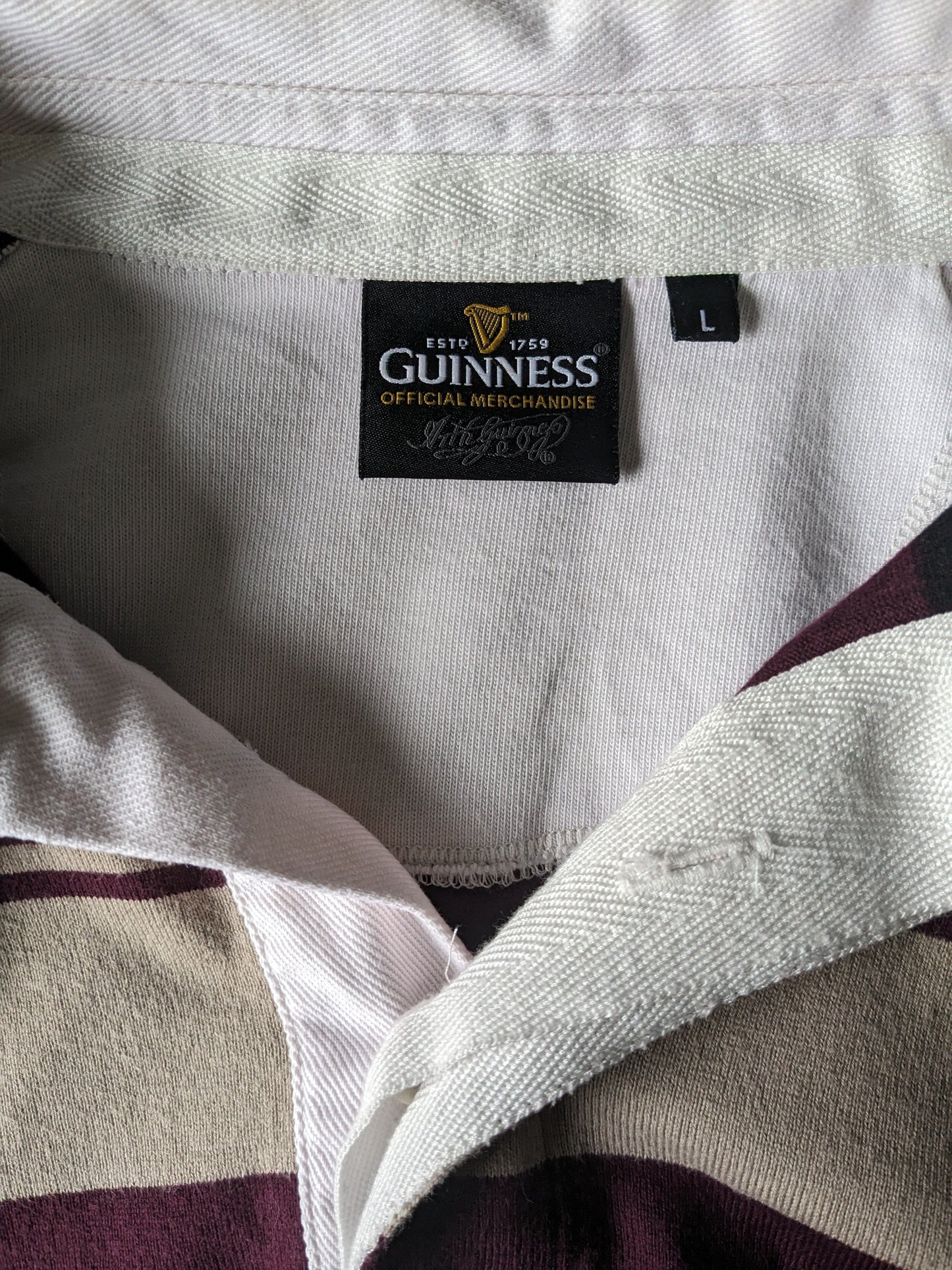 Pull polo Guinness. Bordeaux Beige Rayé Noir. Taille L.