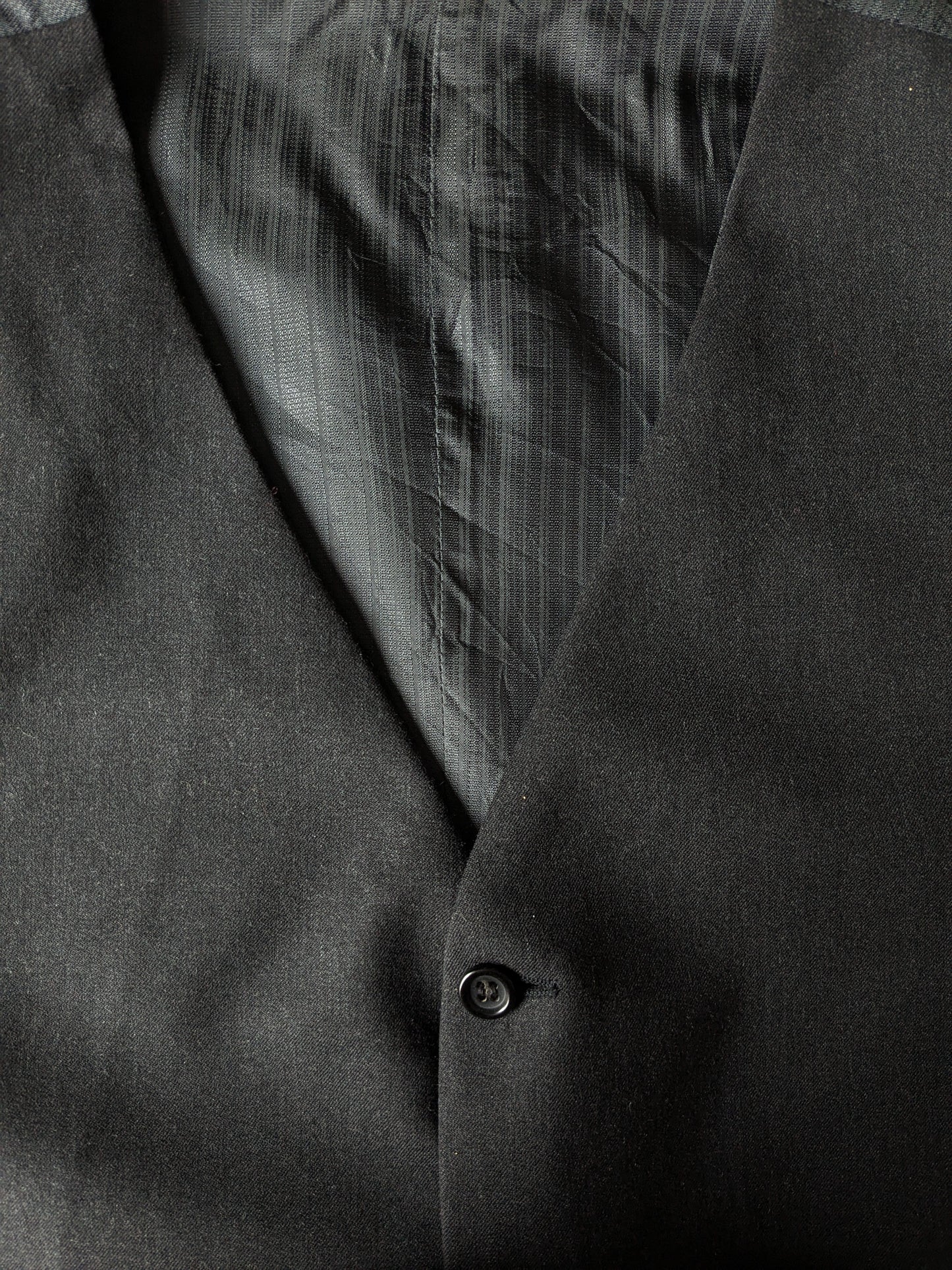 Chaleco de lana. Motivo gris oscuro. Talla L. #334