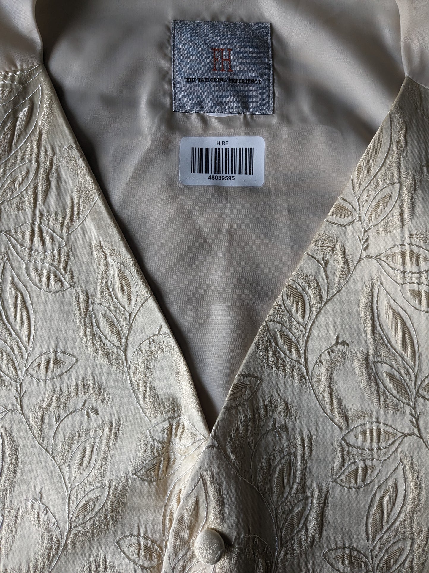 FH-Weste. Beigefarbenes Motiv. Größe 3XL / XXXL.