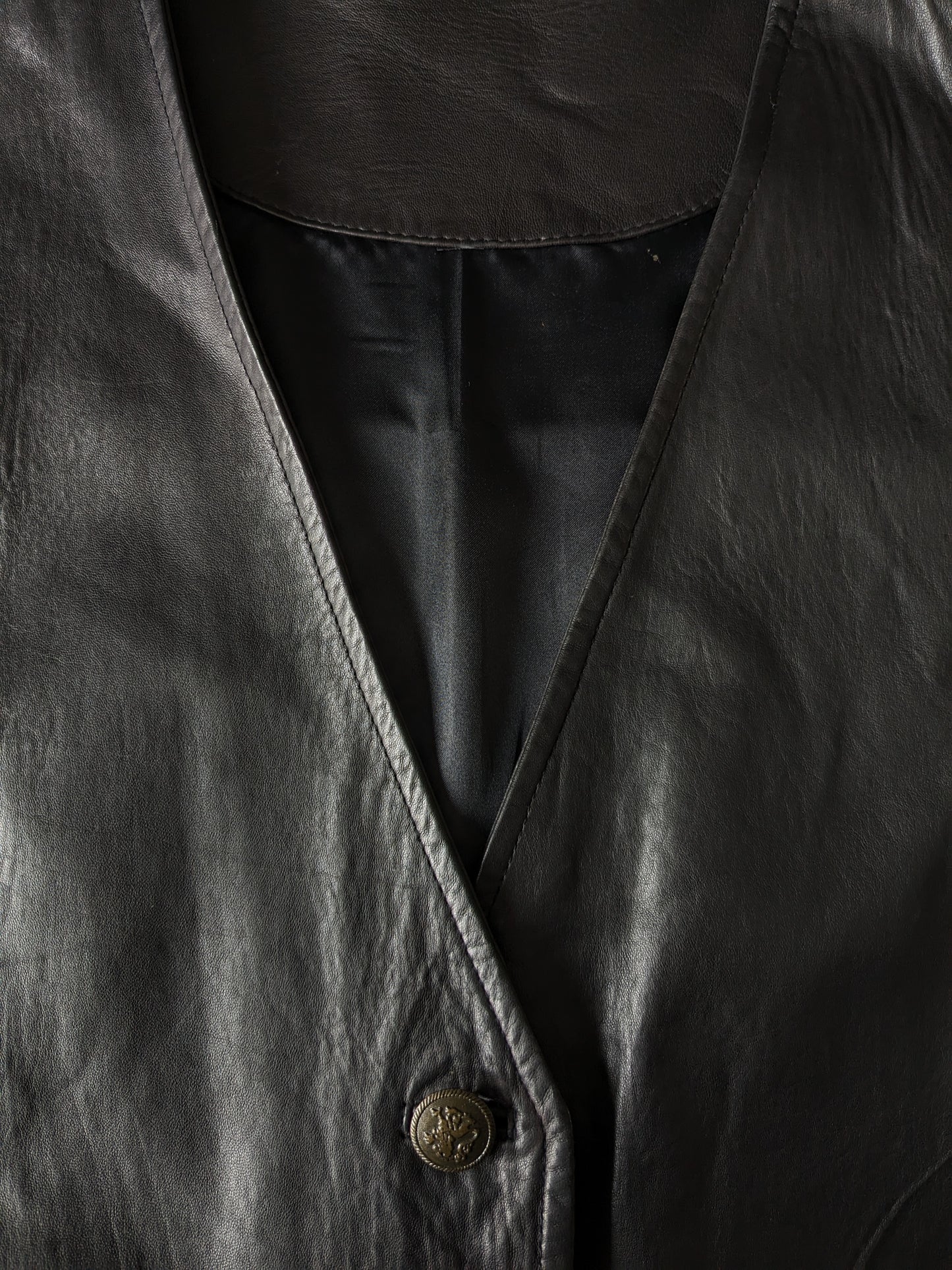 Mid-length double-sided leather waistcoat with beautiful buttons. Dark brown. Size L.