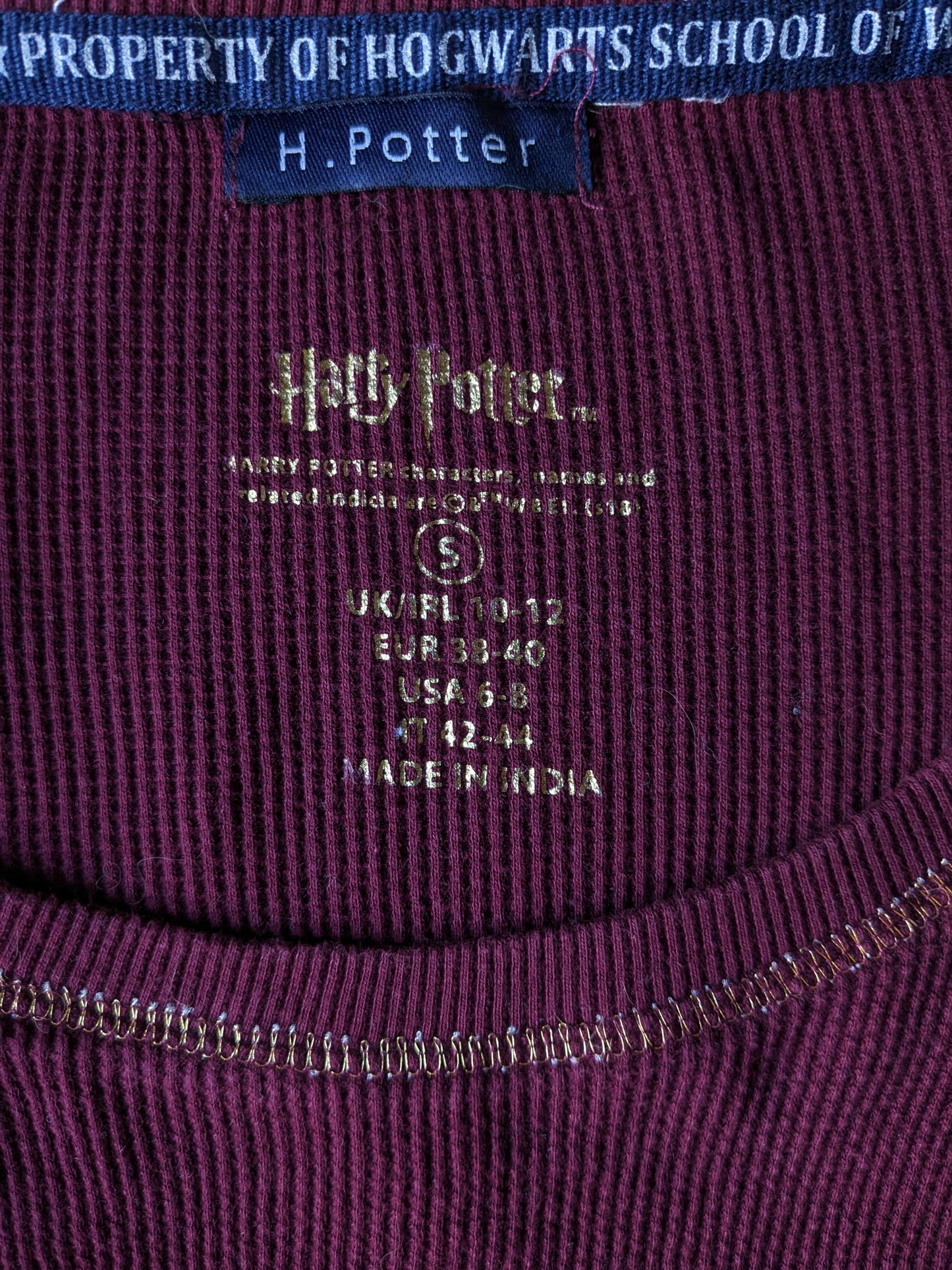 Harry Potter longsleeve. Bordeaux goudkleurig. Hogwarts school. Maat S.