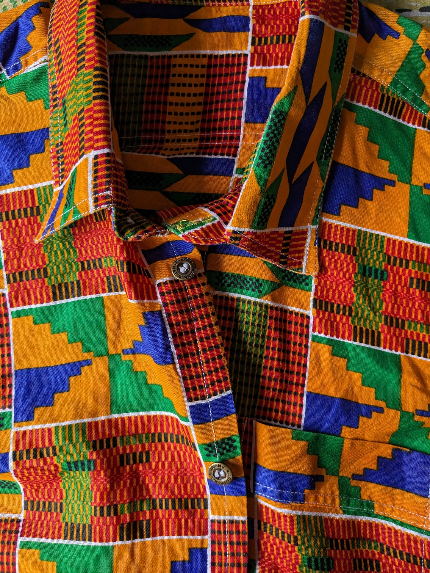 Camisa encerada. Naranja Rojo Azul Verde Estampado africano. Talla M.