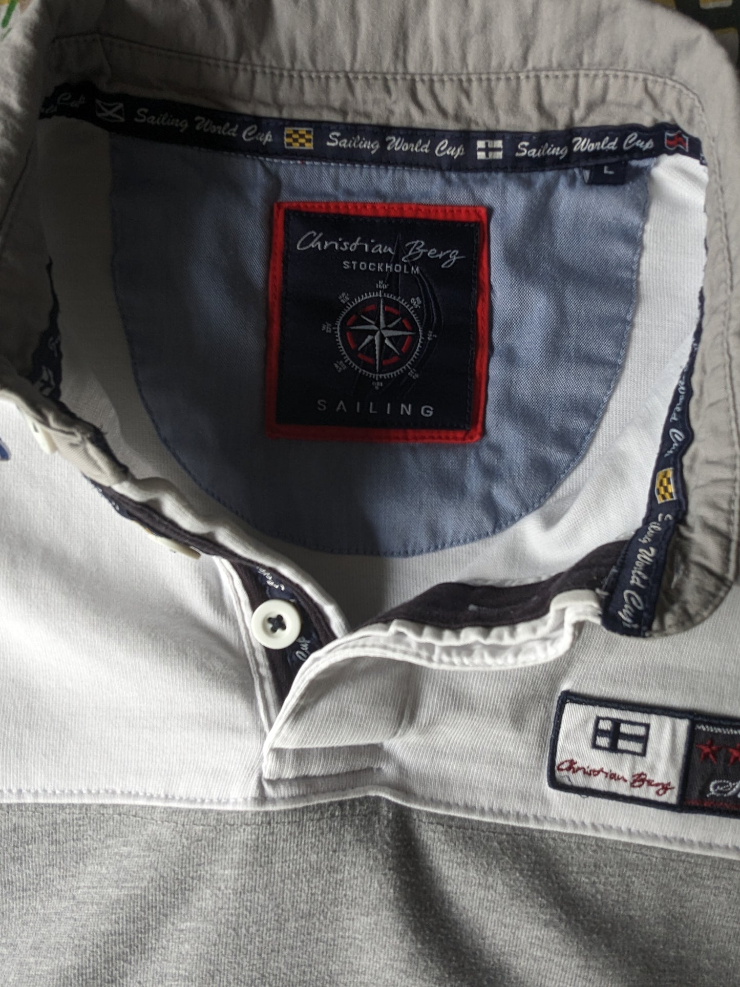 Pull polo Christian Berg. Rayé gris blanc. Taille L.