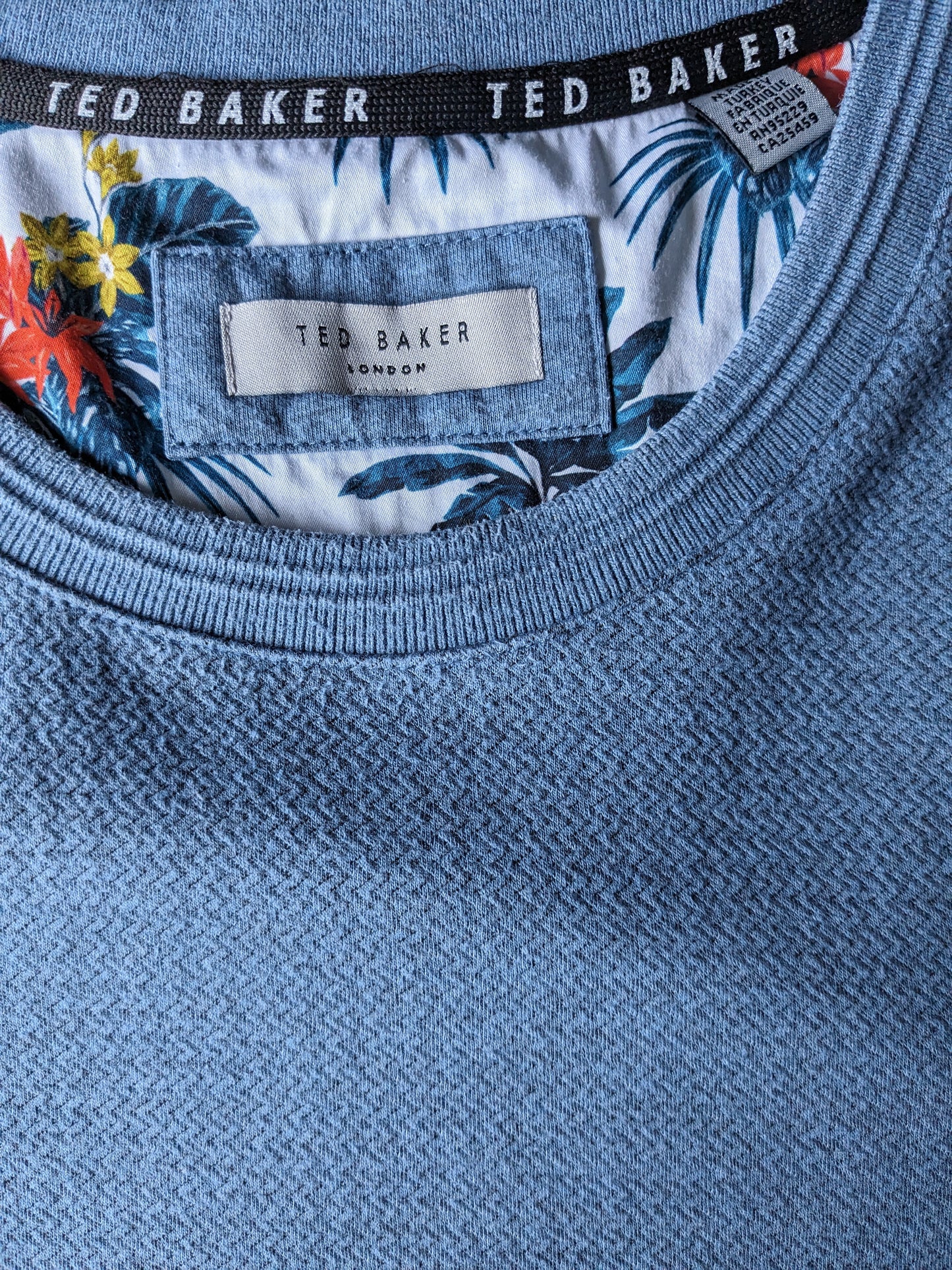 Pull décontracté Ted Baker. Motif chevrons bleus. Taille XL.