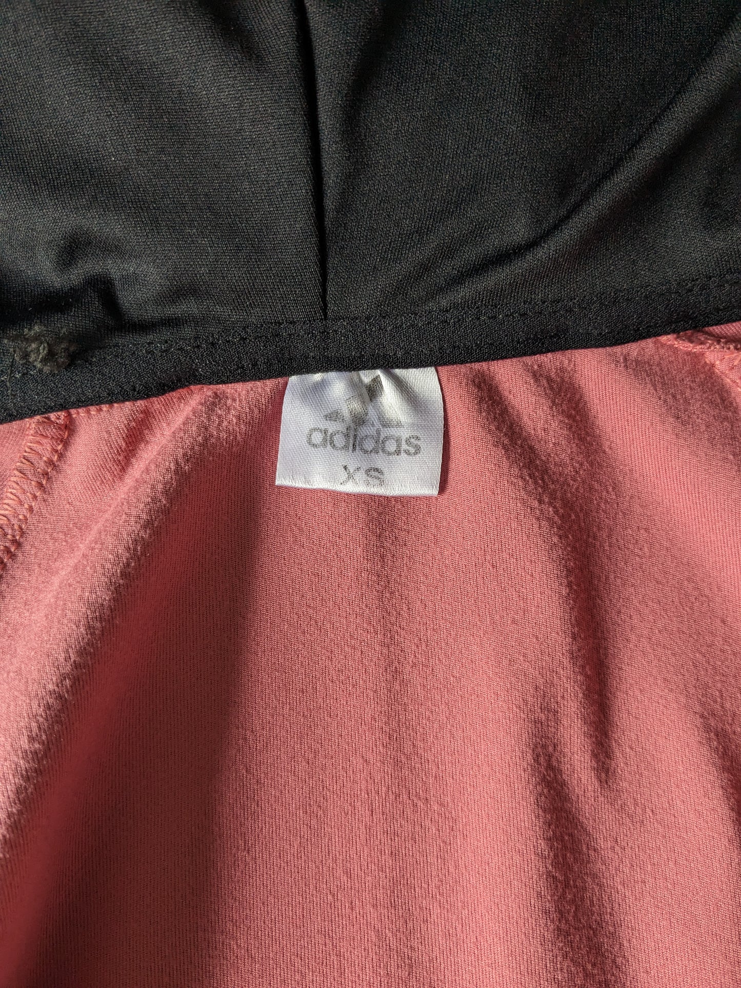 Vintage Adidas sport vest met capuchon. Roze gekleurd. Maat XS.