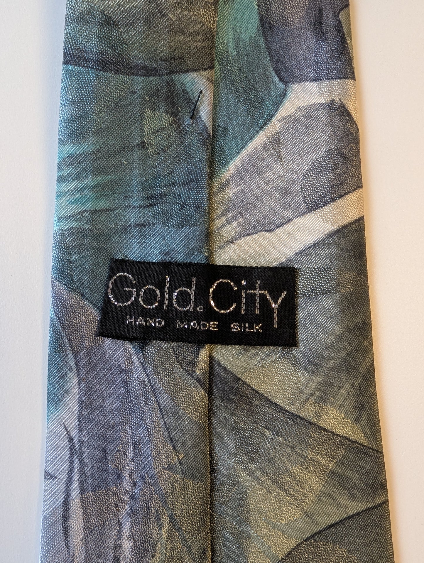 Vintage Gold City stropdas. Zijde.