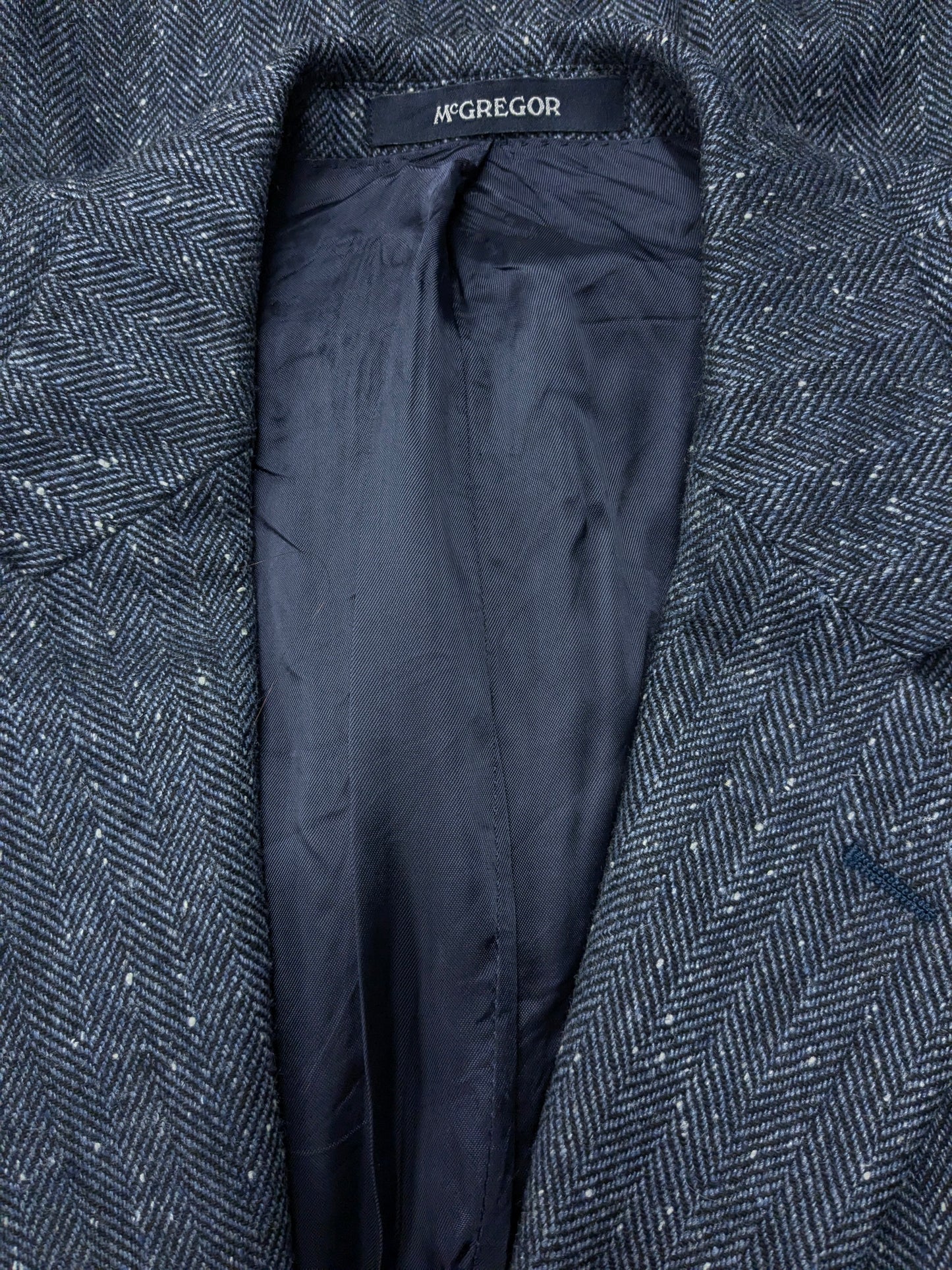 McGregor Wolljacke. Blaues grau gemischtes Fischgrätenmotiv. Größe 27 (54 / l)
