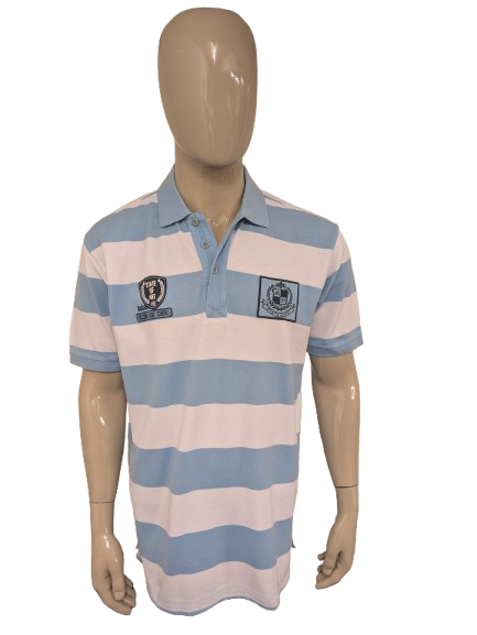 State of Art polo. Blauw Wit gestreept met applicaties. Maat XL.