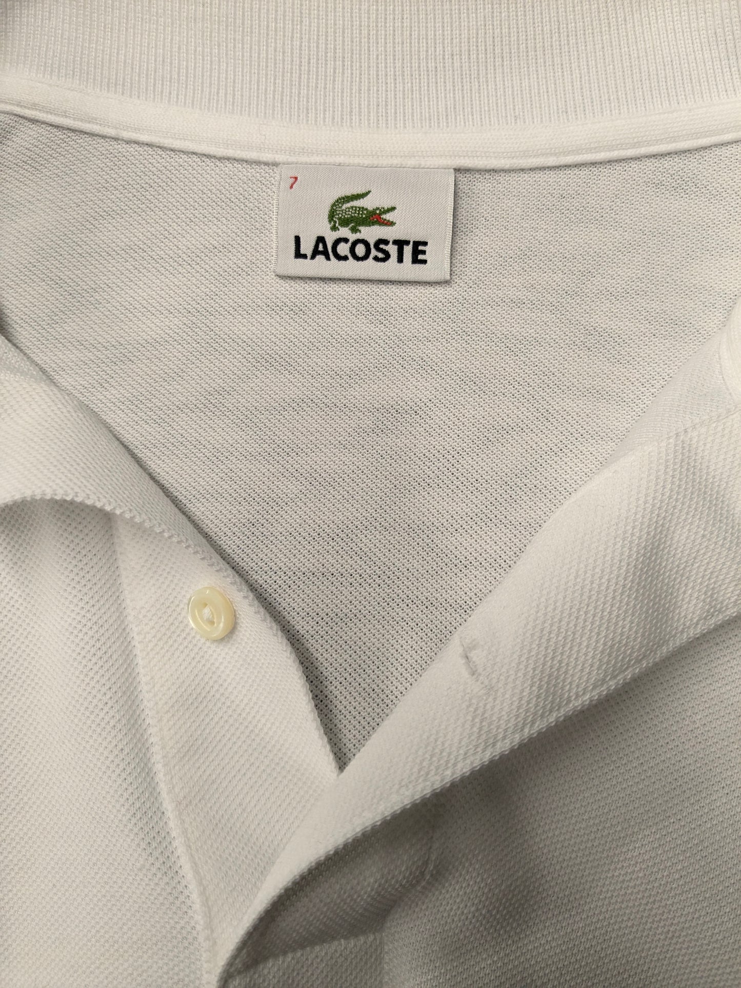 Lacoste polotrui. Wit gekleurd. Maat 7 / 2XL / XXL.