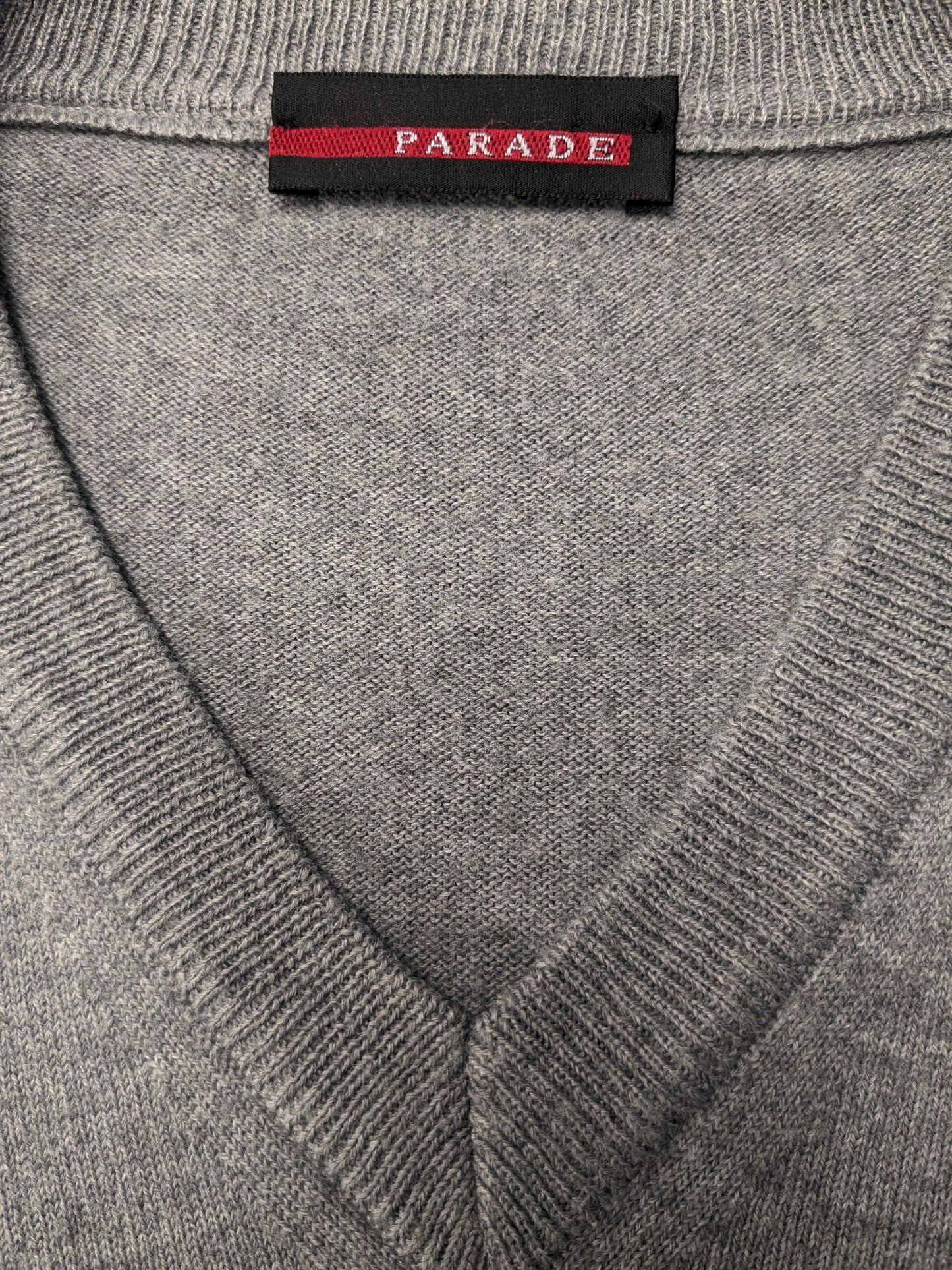 Parade en laine Spencer. Gris clair de couleur. Taille L. 50% de laine.