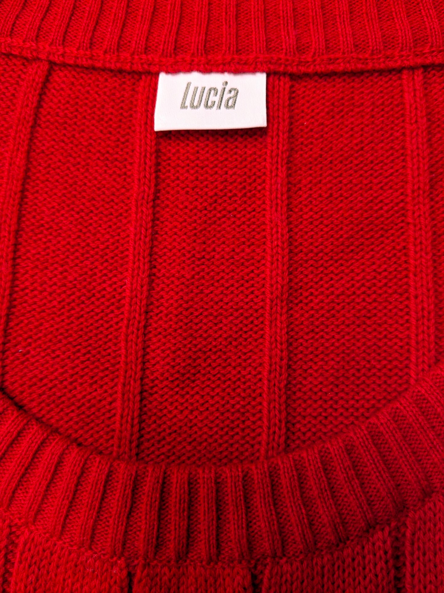 Lucia Woolen Spencer. Motif de pull à câble rouge. Taille L. 50% de laine.