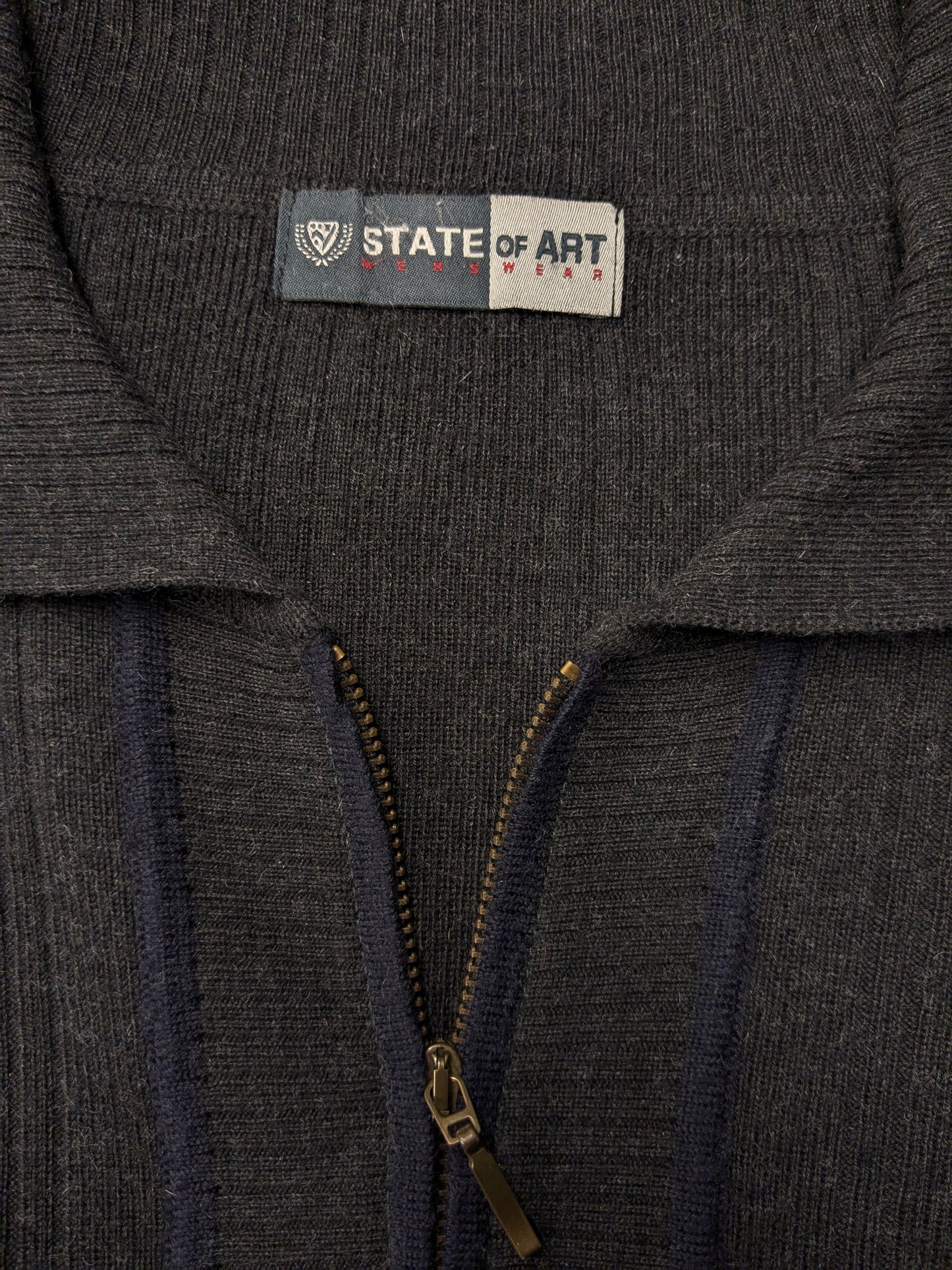 Estado de arte de lana suéter de polo con cremallera. Color gris oscuro. Tamaño 2xl / xxl. 60% de lana.