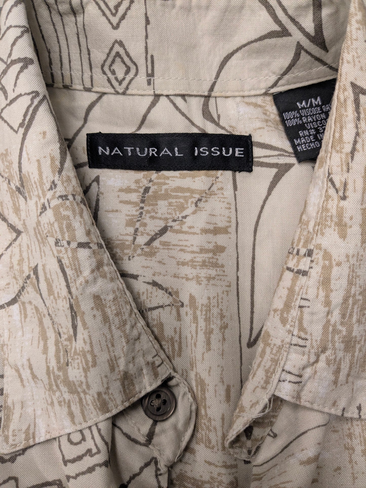 Shirt a problema naturale manica corta. Viscosio al 100%. BEIGE Brown Print. Taglia XL.