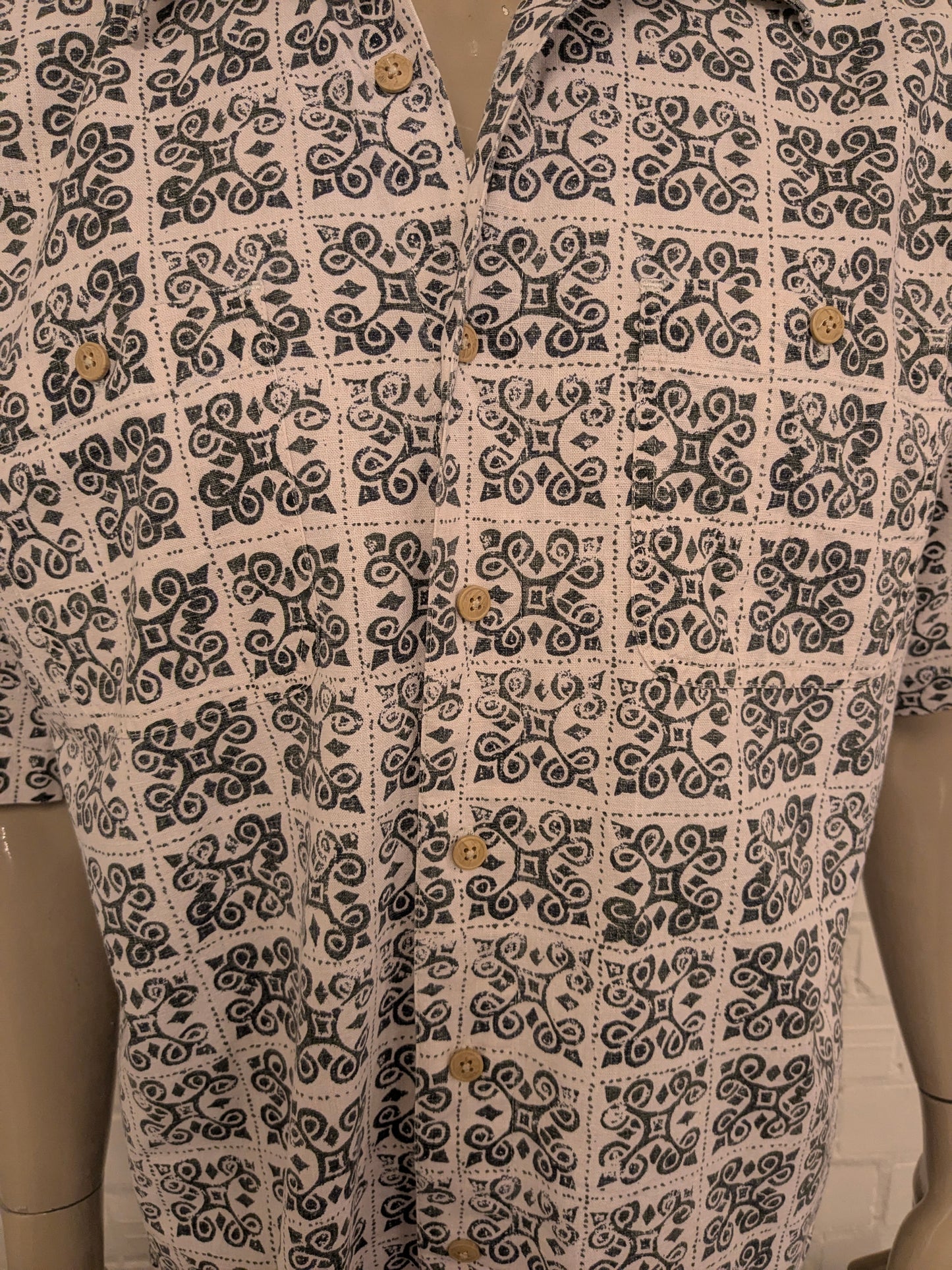 Camiseta de lino Cambridge Cambridge Camina corta. Impresión beige verde. Tamaño M / L. 55% de lino.