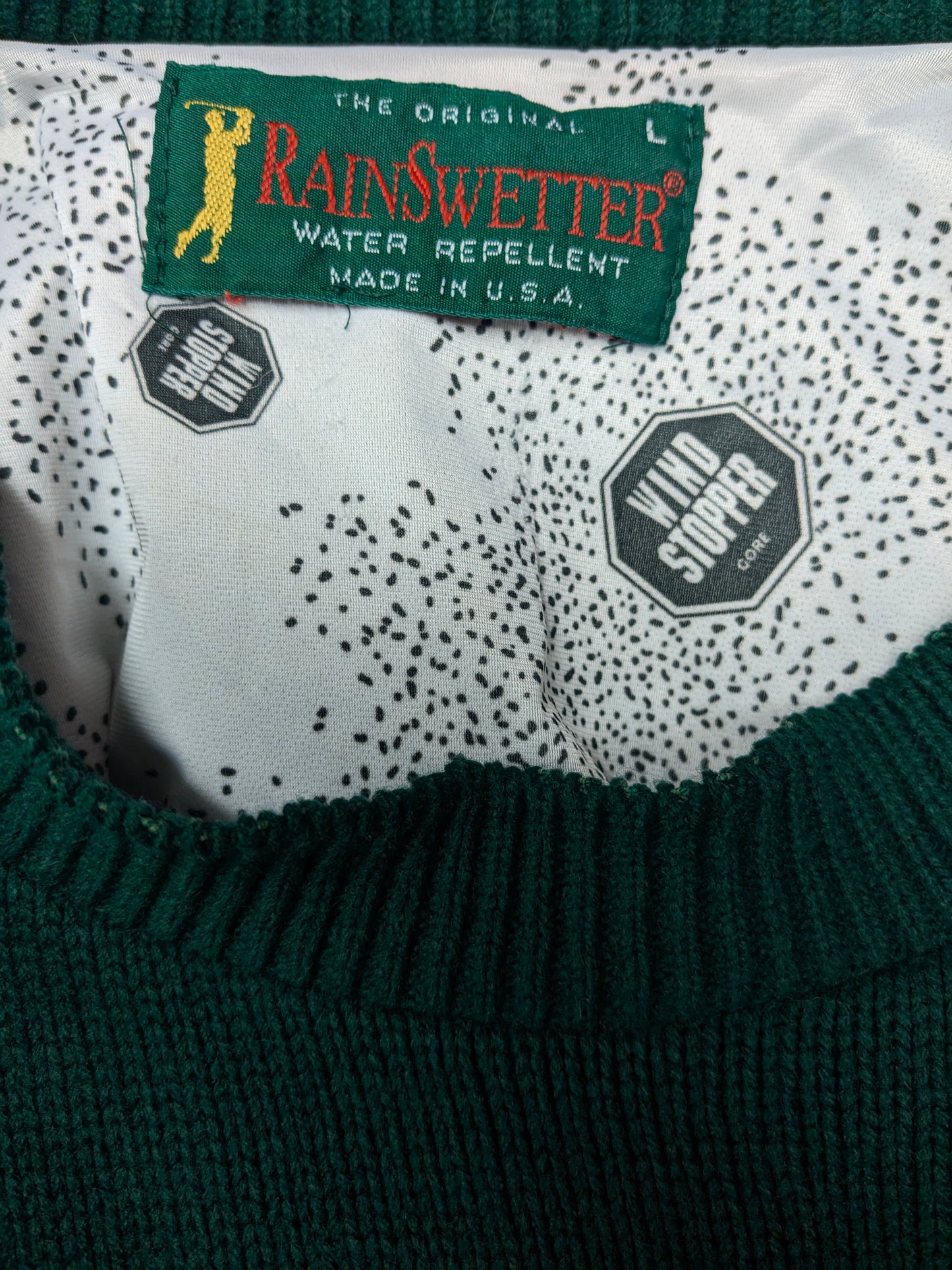 Pull de pluie vintage Eau et pull de golf à travers le vent. Vert coloré. Taille xl.