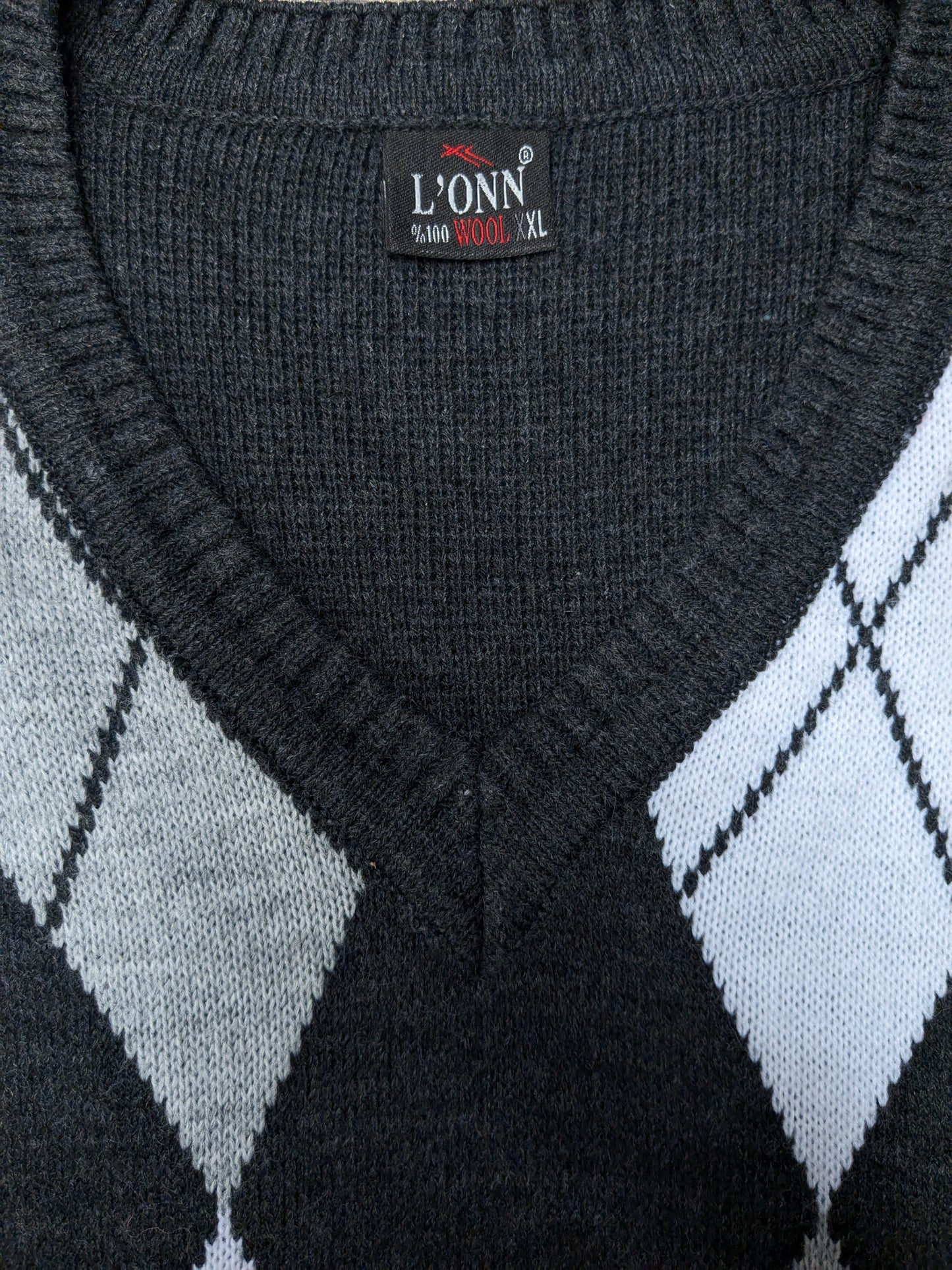 Magione di lana l'Onn vintage con scollo a V. Stampa argyle bianca grigia. Taglia XL. Lana al 100%.