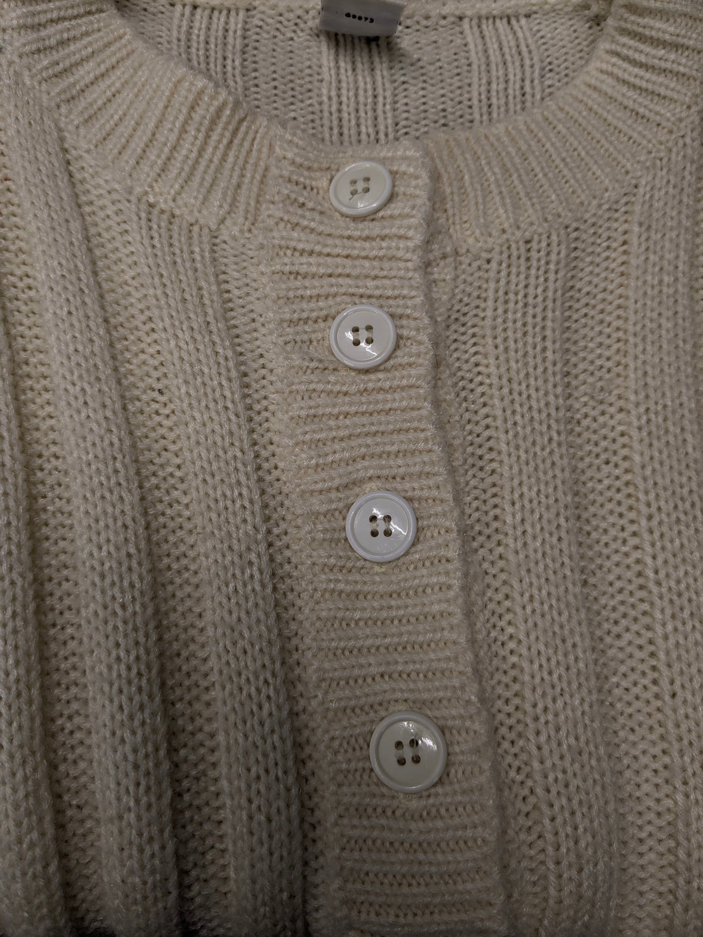 Vintage trui met knopen. Beige gekleurd. Maat M.