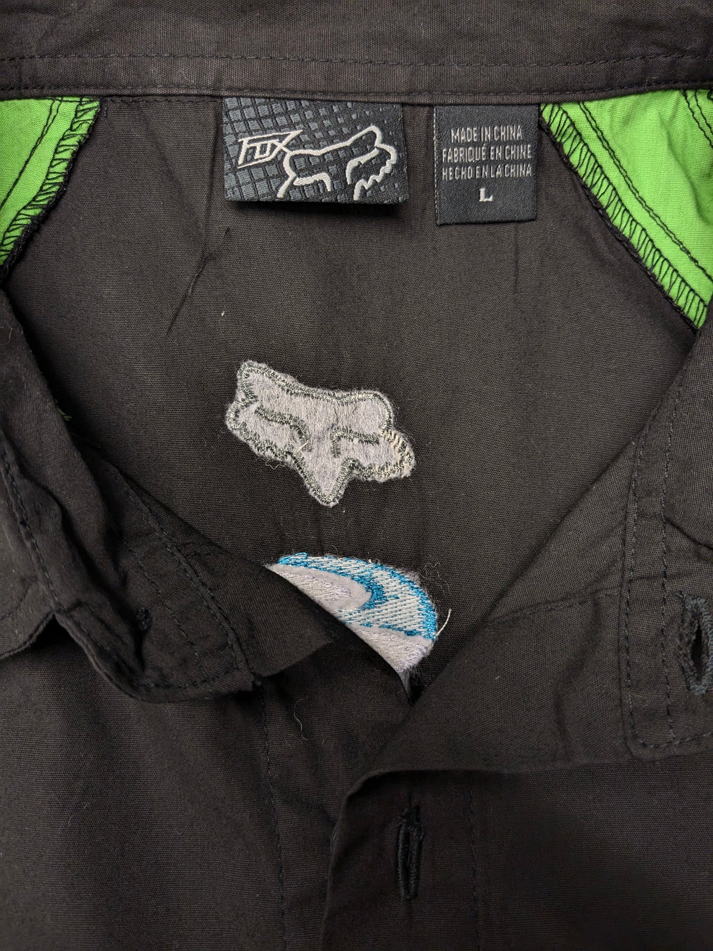 Fox shirt short sleeve. Black Green with applications. Size L.