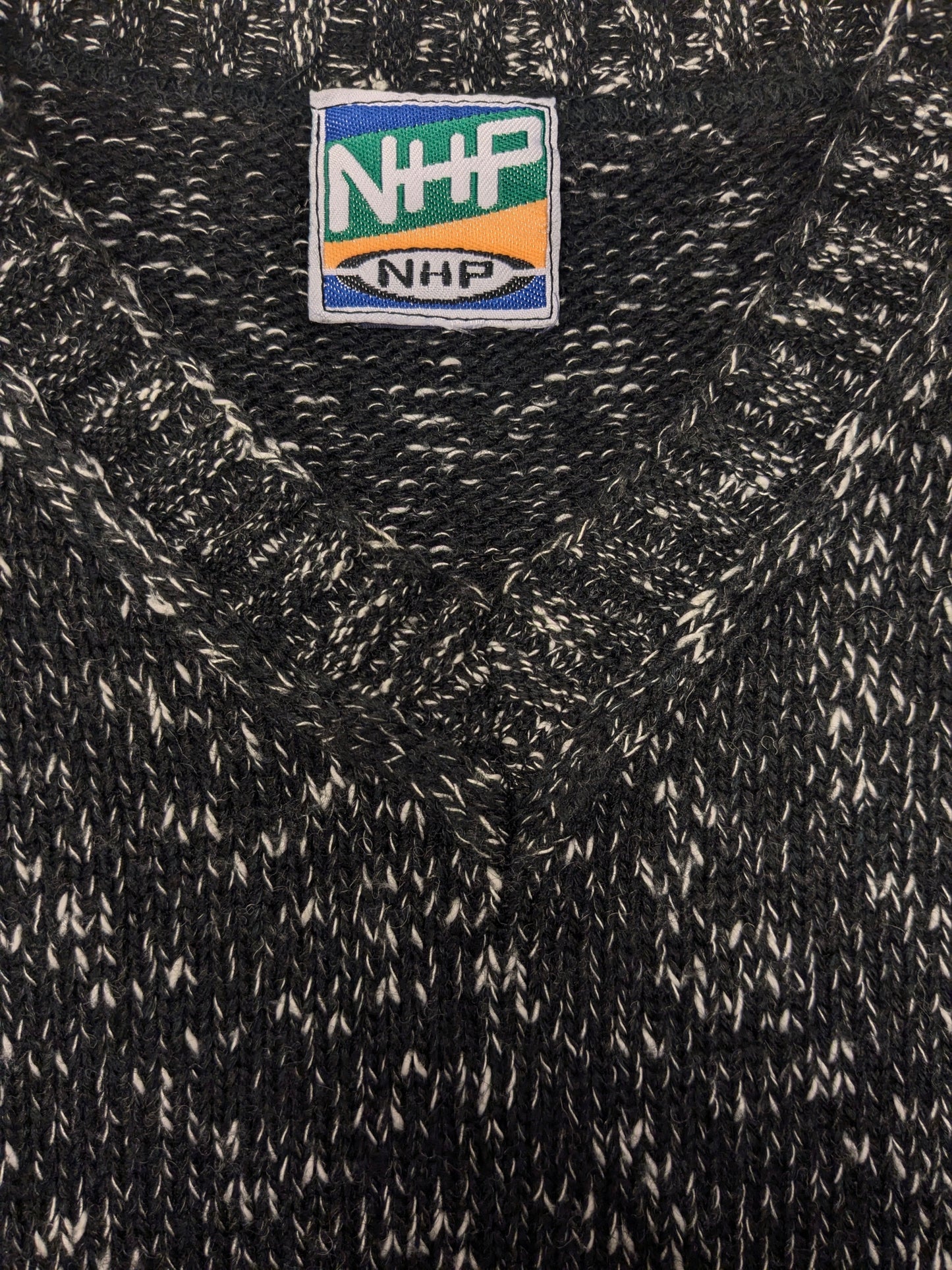 Vintage NHP sweater with V-neck. Black and white mixed. Size L.