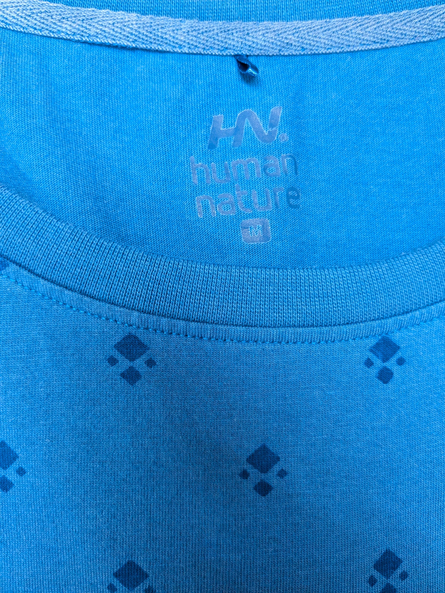 Human Nature singlet. Blauw met opdruk. Maat M.