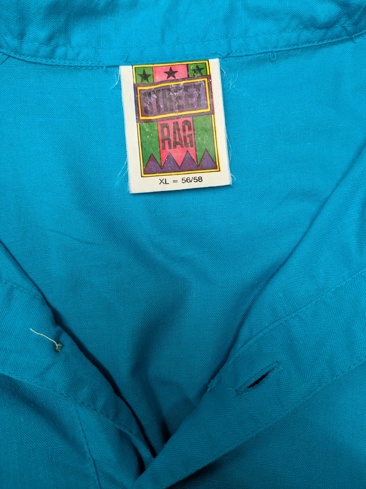 Vintage Street Rag polo met elastische band. Blauw met opdruk. Maat XL.