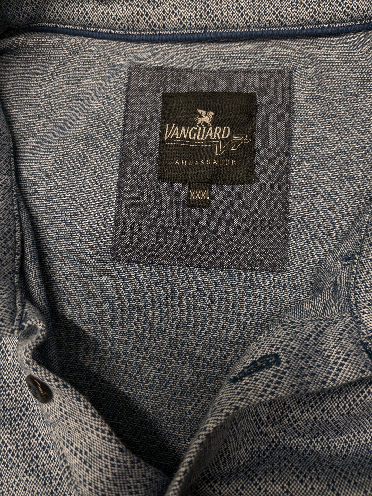 Vanguard polo. Blauw gekleurd motief. Maat 3XL / XXXL.