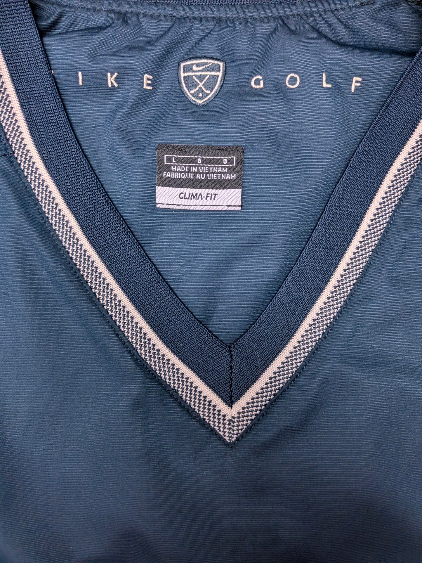 Nike Golf spencer with V-neck. Dark Blue colored. Size XL.
