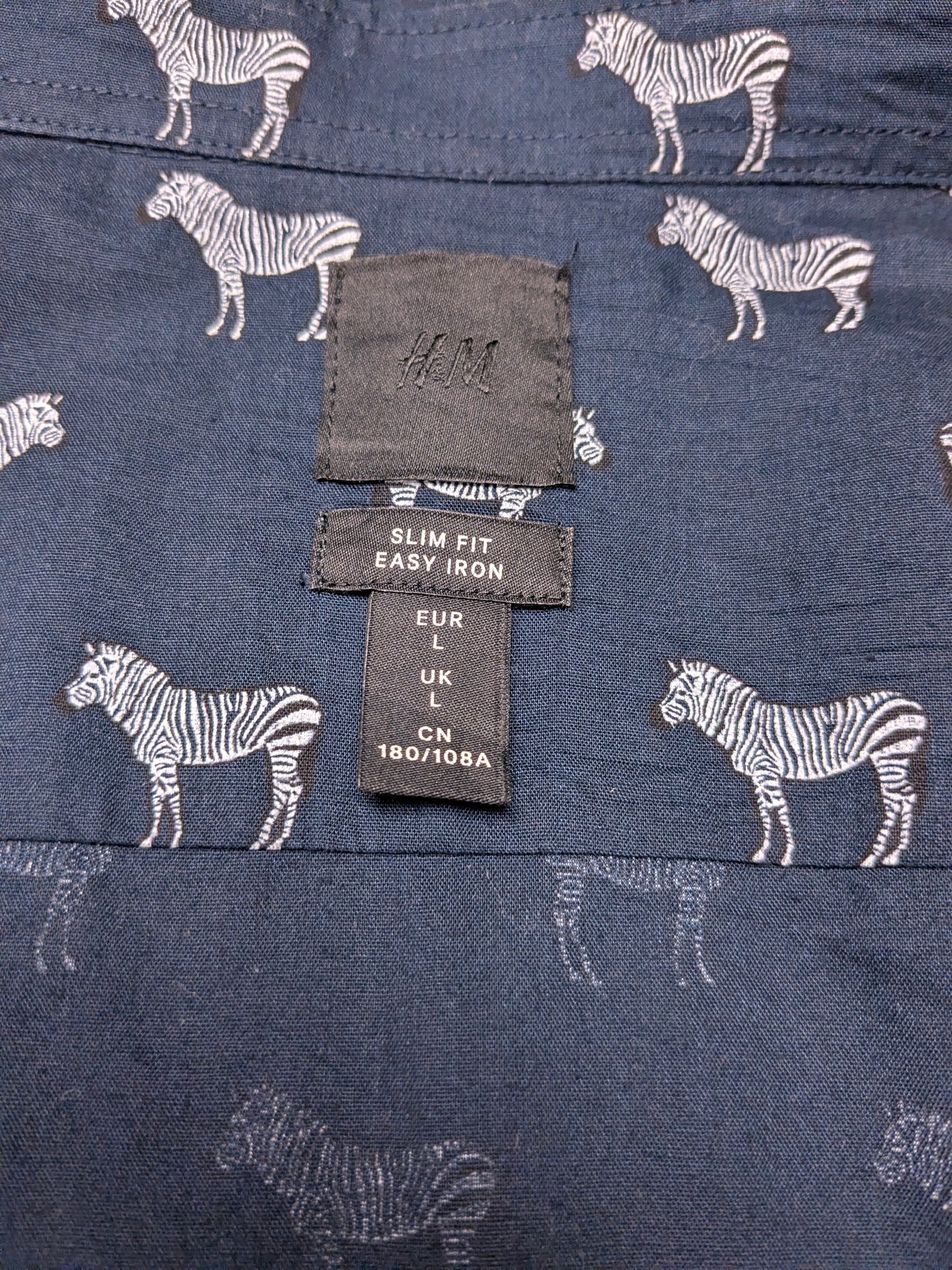 H&M overhemd. Blauw Witte zebra print. Maat L. slim fit.