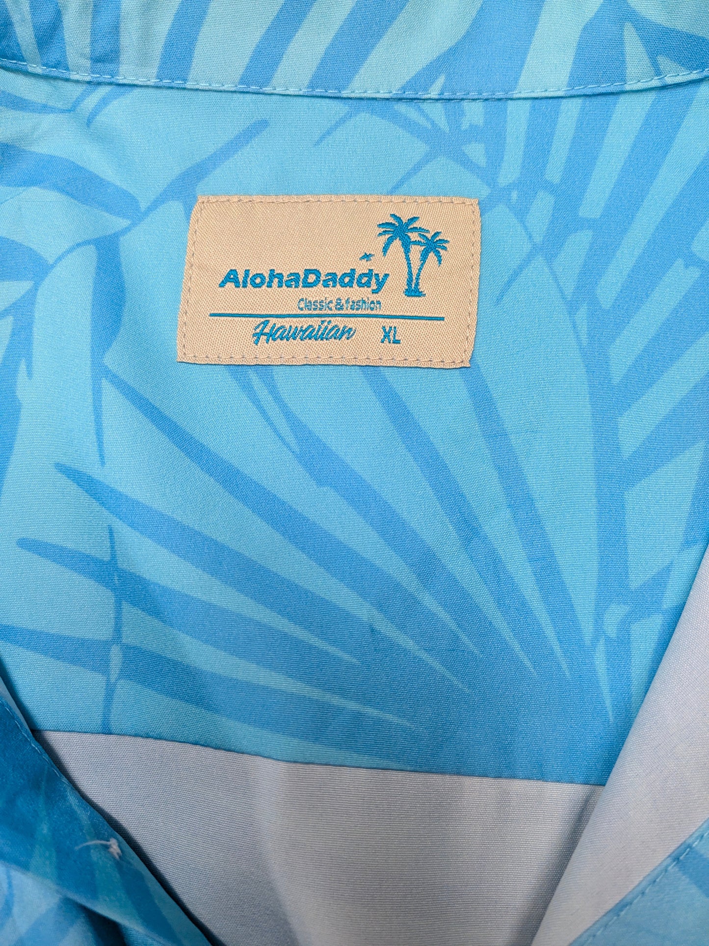 Aloha Daddy Hawaii overhemd korte mouw. Blauw Blad motief. Maat XL.