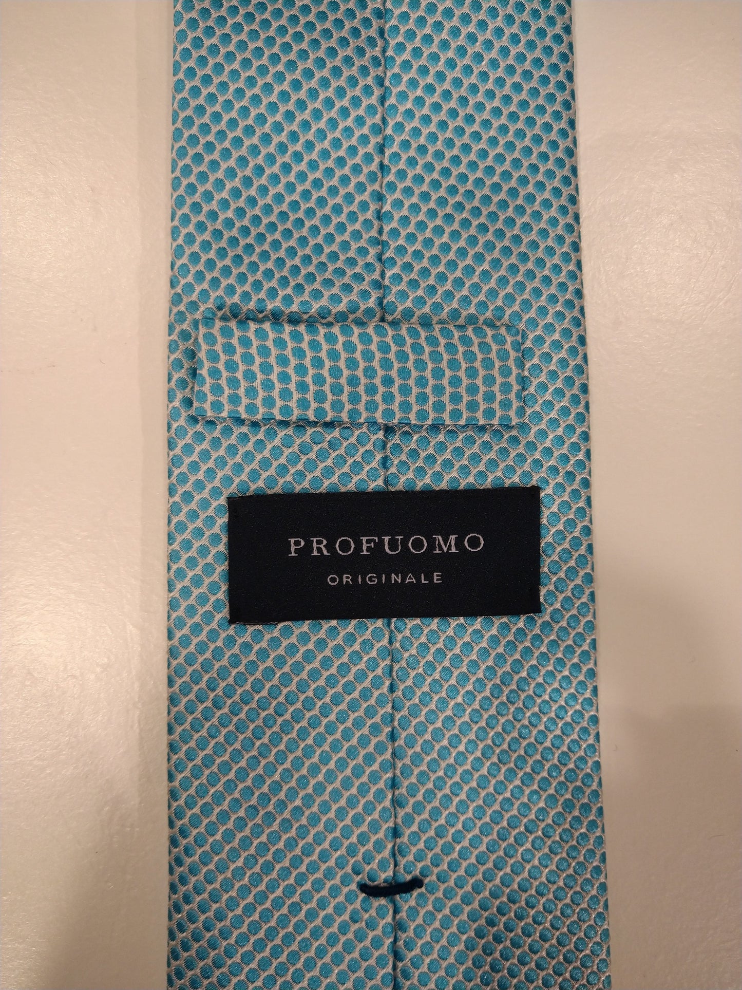 Tie à la soie Profuomo. Motif de boules blanches bleues.