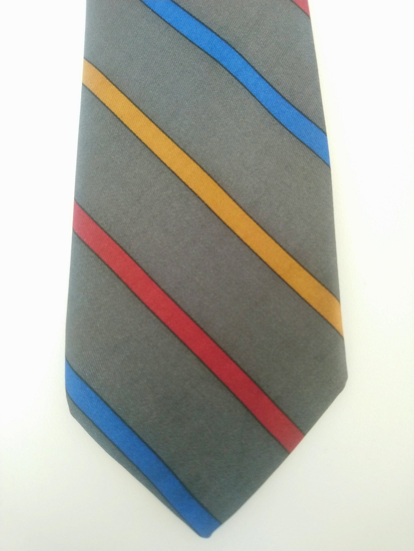 Vintage smalle stropdas. Grijs / rood / blauw gestreept. Zijde