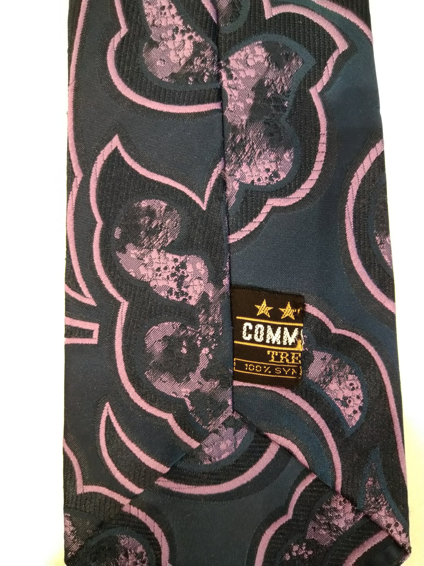 Tie in poliestere Commodore. Motivo blu viola.