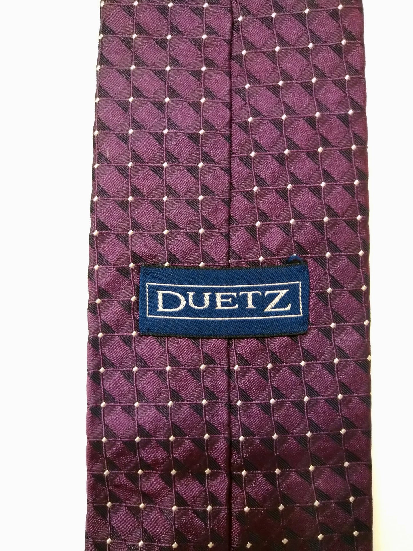 Duetz zijde stropdas. Paars motief.
