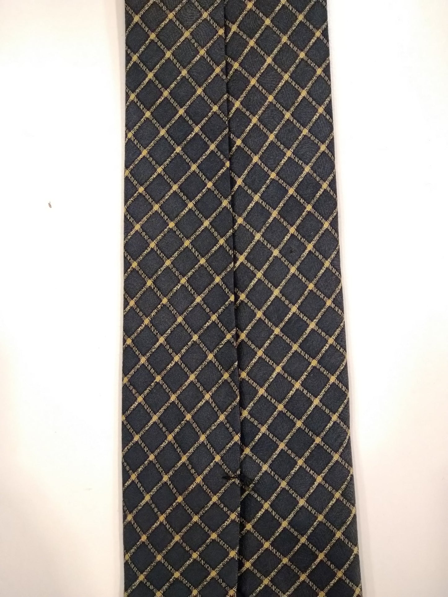 TIPA BLAF POLIESTRO. Motifa gris beige.