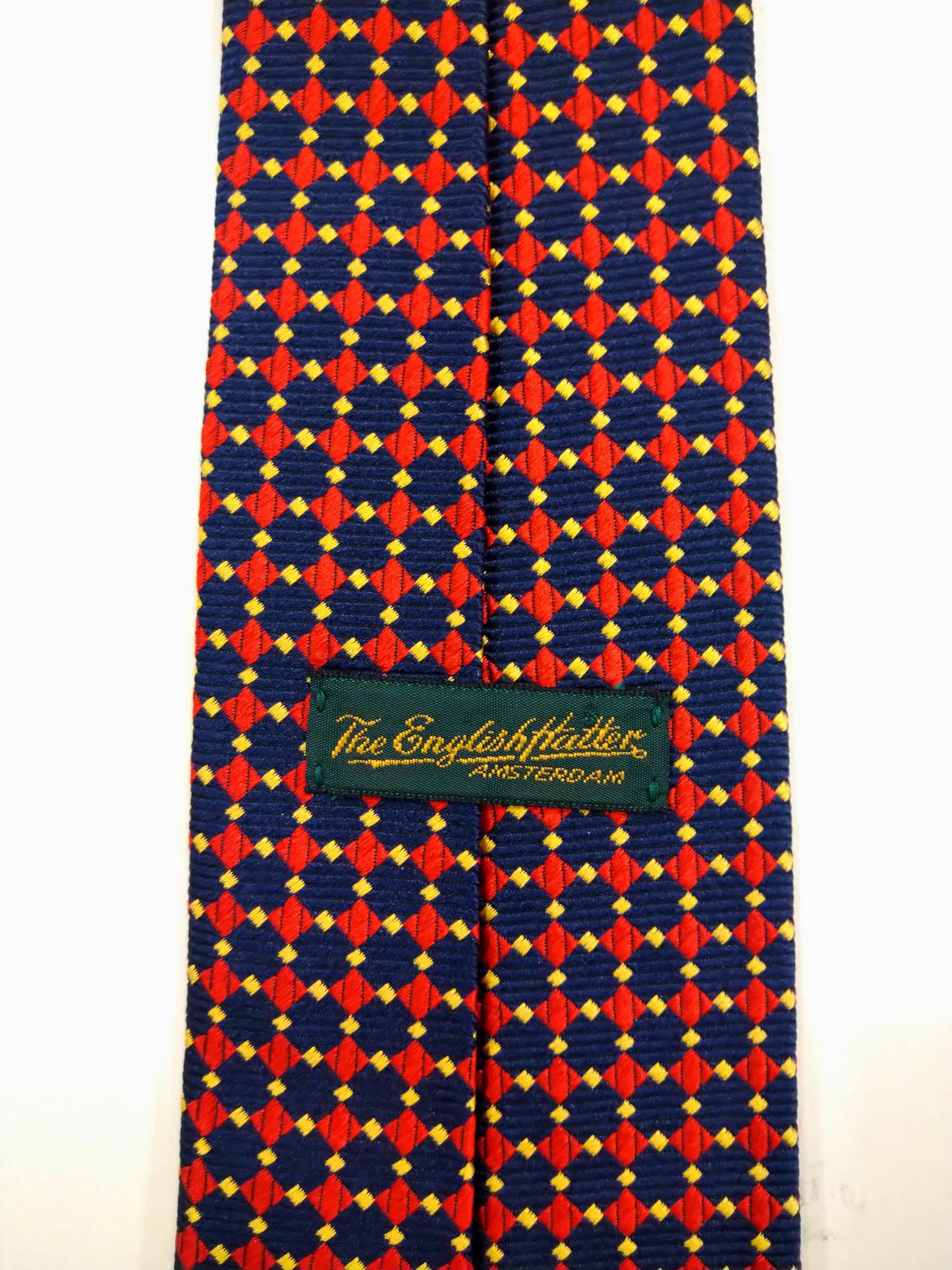 The English Hatter hand made zijde stropdas. Mooi blauw rood motief.