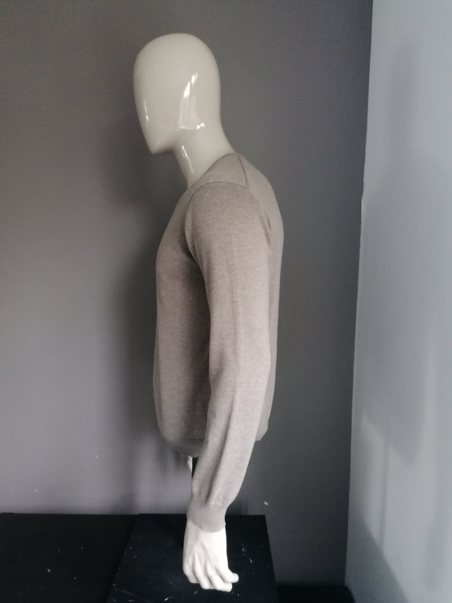 Pacte. Pull en laine avec col en V. Couleur brune. Taille M.