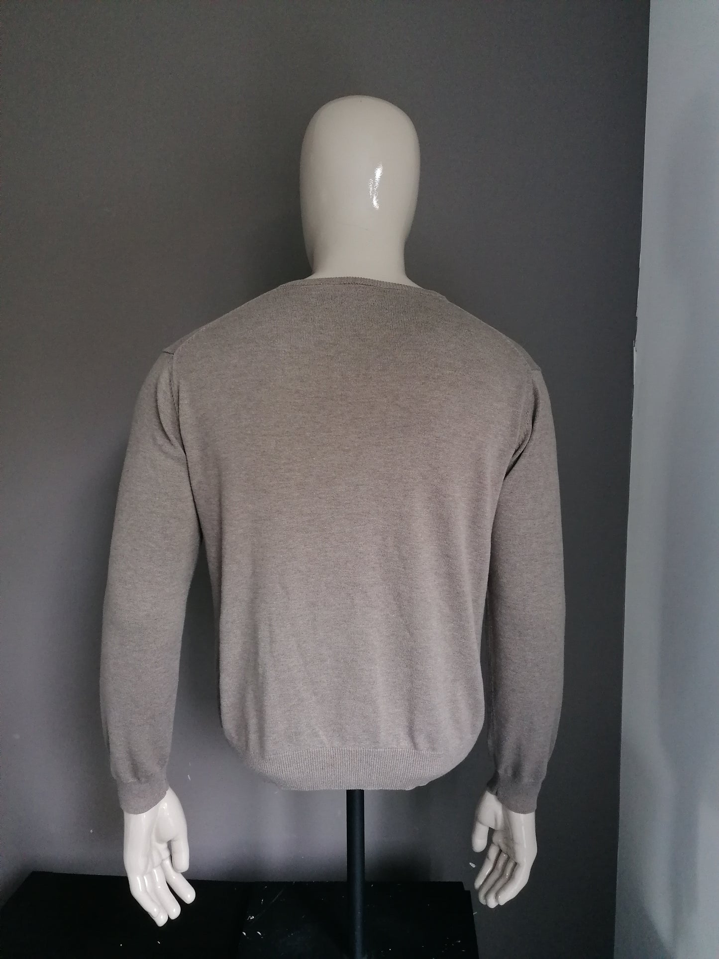 Pacte. Pull en laine avec col en V. Couleur brune. Taille M.