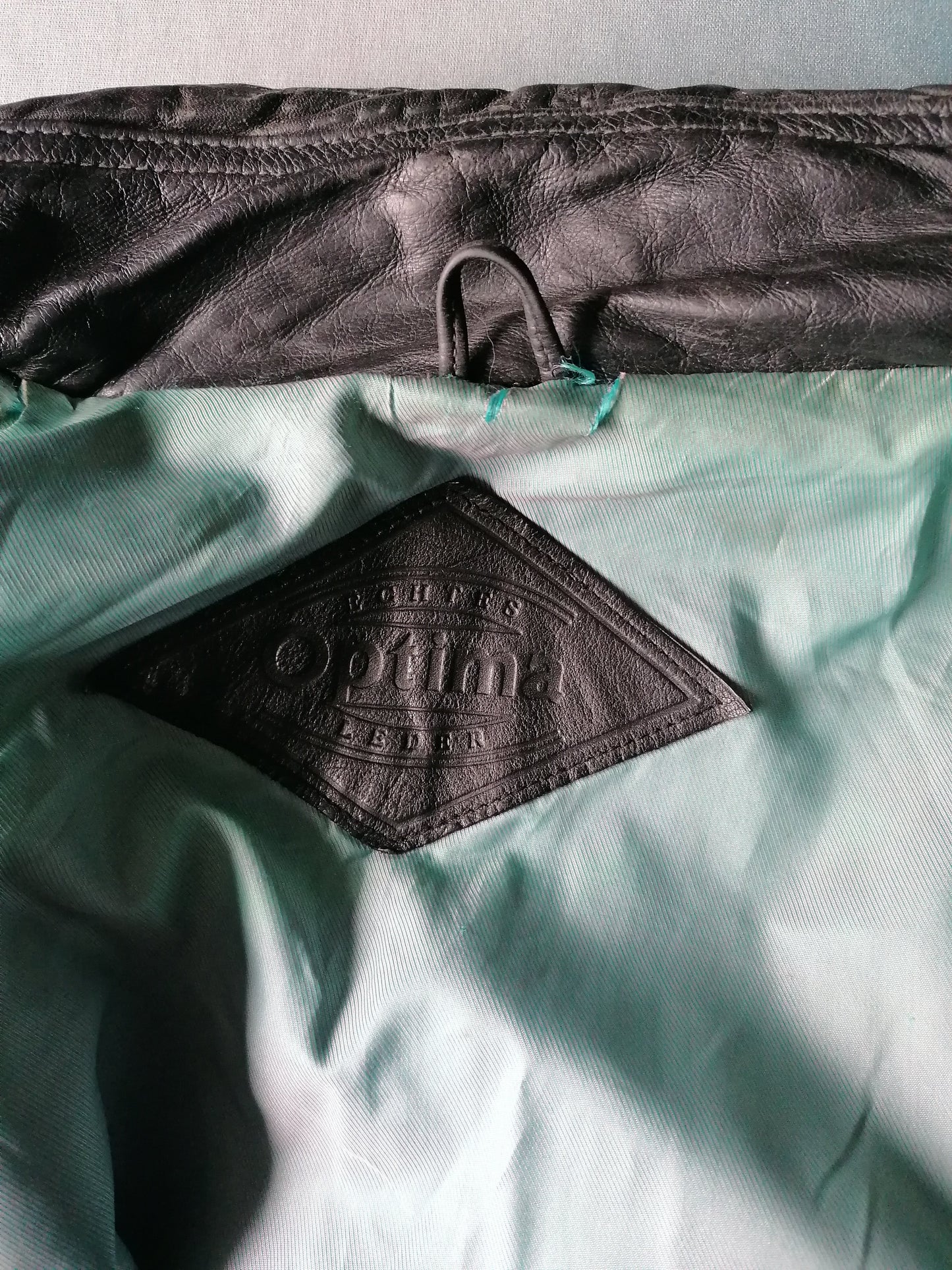 Vintage half long leather jacket. Black green colored. Size XL