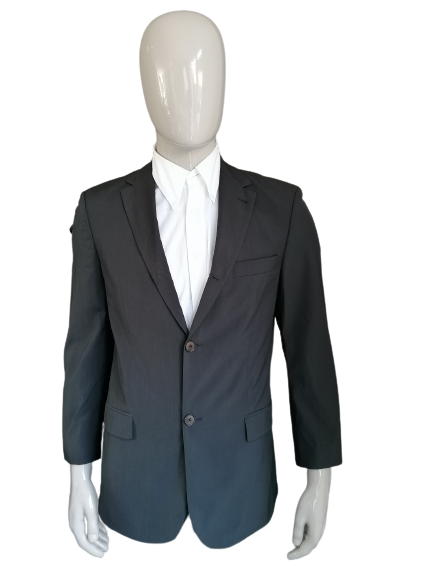 Vintage Hugo Boss jacket. Dark green colored light glossy. Size