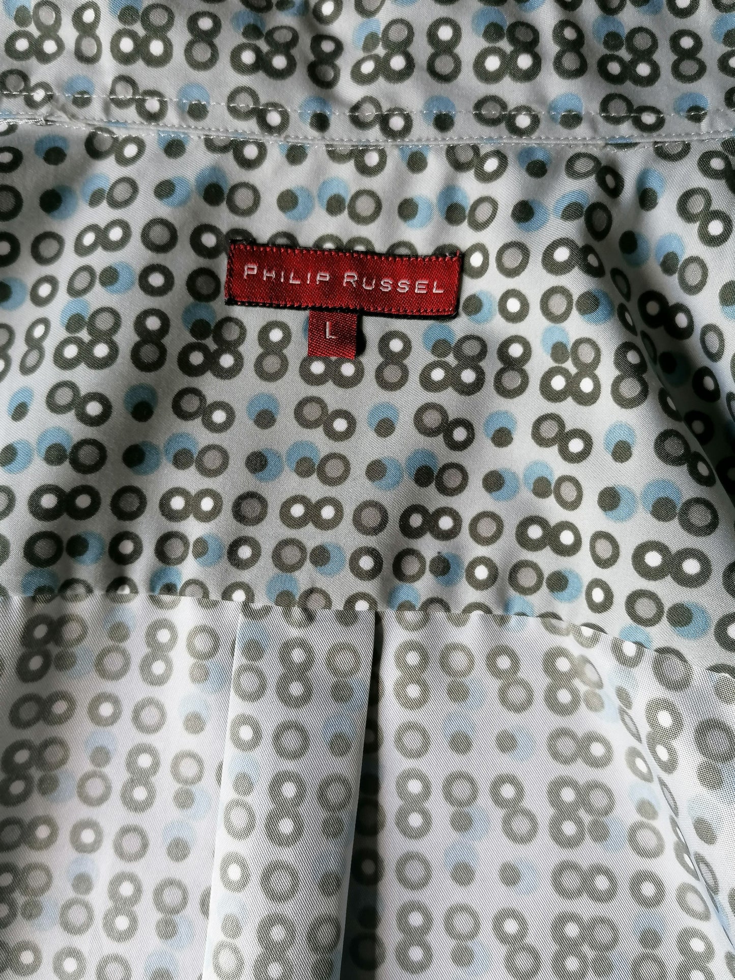 Camisa de Philip Russel. Impresión azul gris. Tamaño L. 100% poliéster