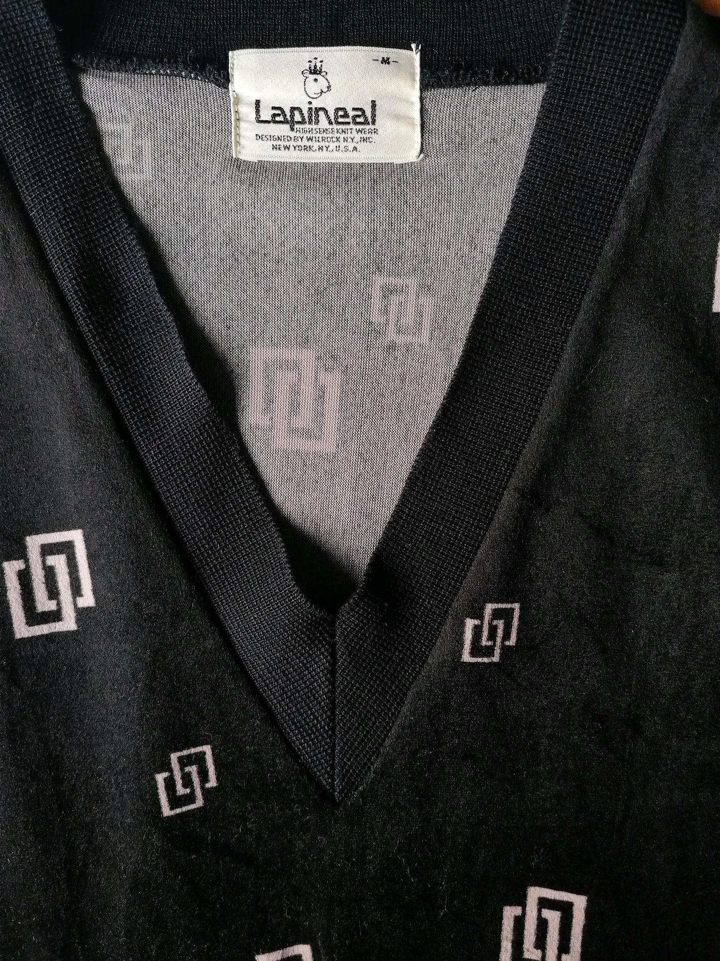 Maglione velluto / velluto lapineale con scollo a V. Stampa beige nera. Taglia M.