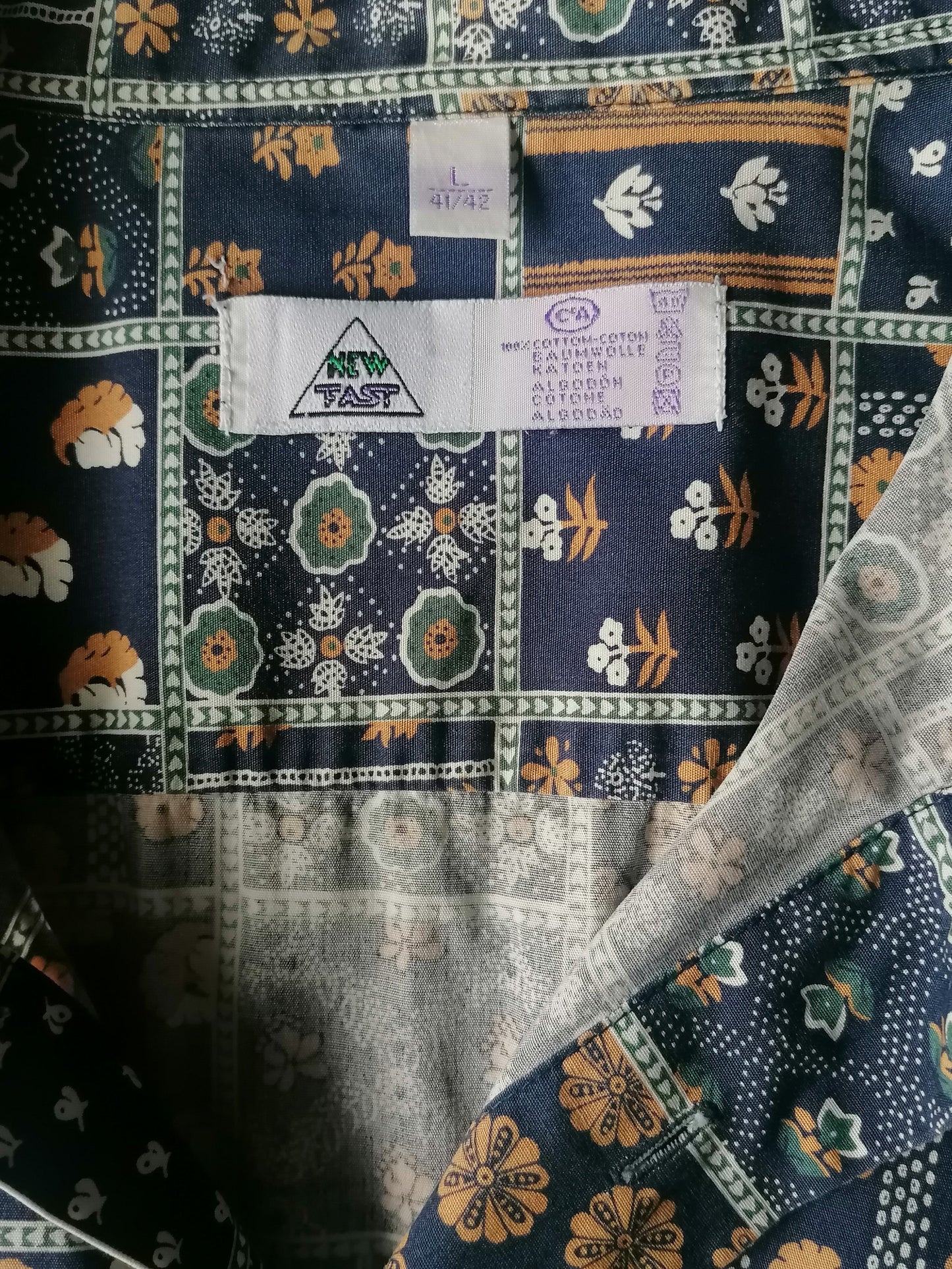 Vintage new fast shirt short sleeve. Blue brown print. Size L / XL.