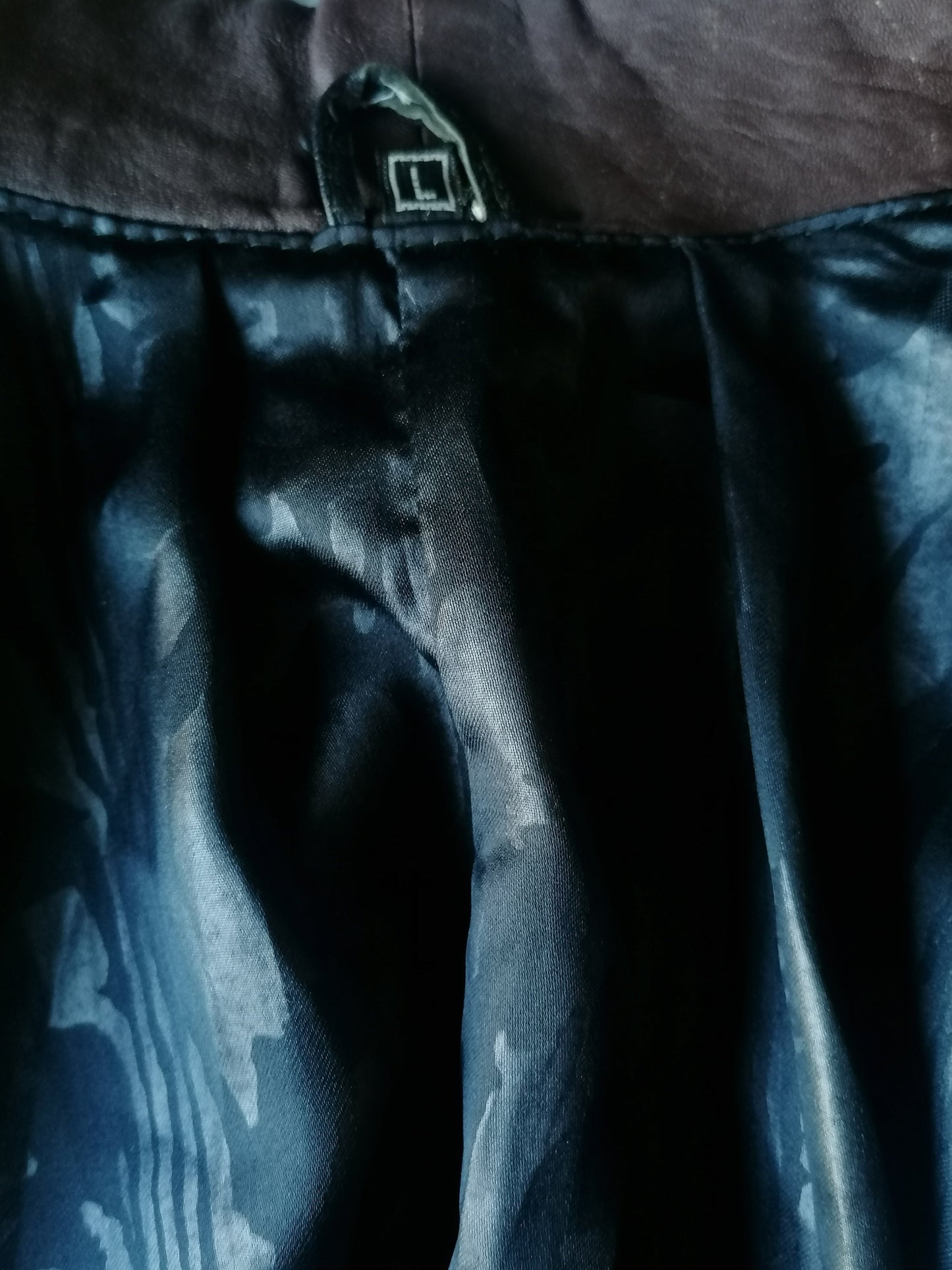 Chaqueta de cuero Vintage 80S-90 con doble cierre. Color negro marrón. Tamaño L / XL.