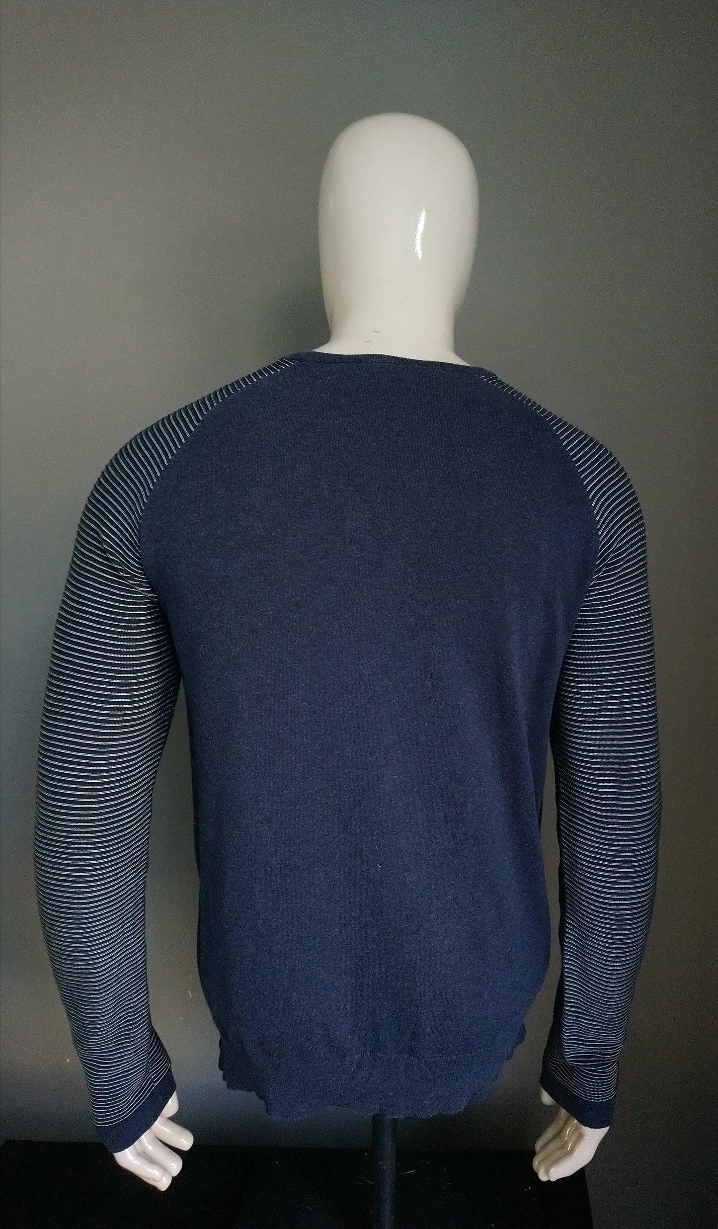 Genti sweater. Dark blue with striped sleeves. Size L.
