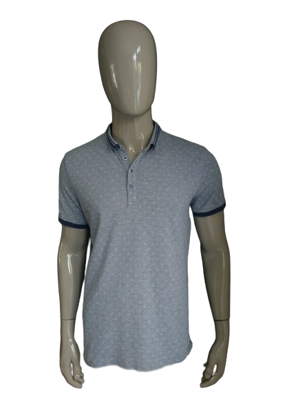 Blue Industry Polo. Gray white print. Size XL.