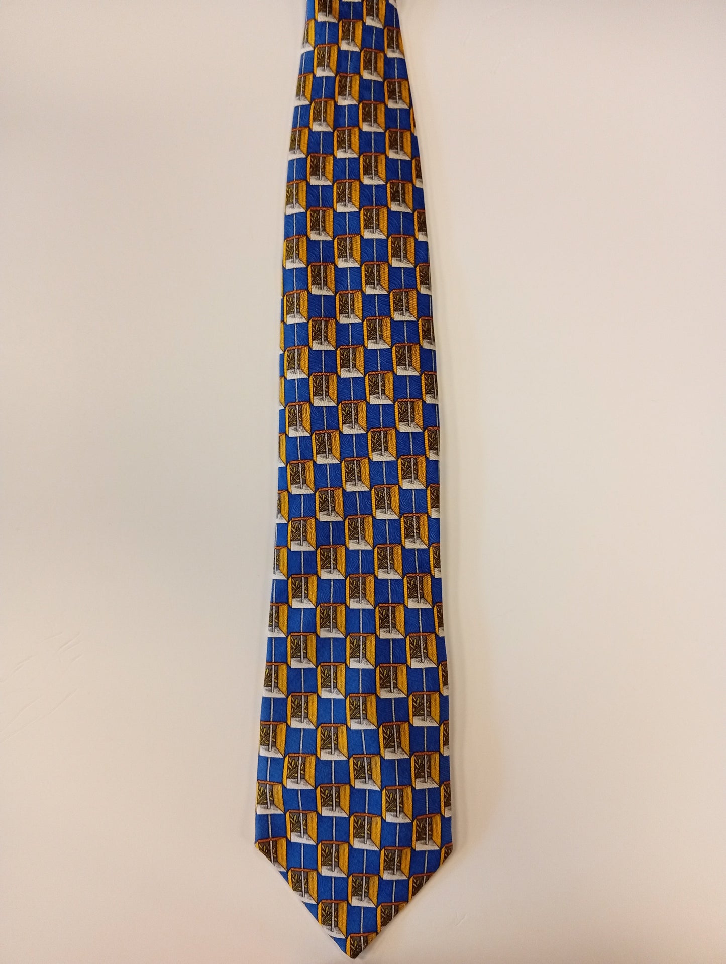Zijden stropdas – blauw met geel patroon – opvallende stijl – Michaelis