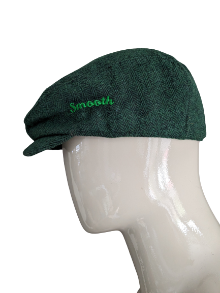 Wollen flat cap / pet "Smooth". Groen Zwart visgraat motief. 55 cm omtrek.