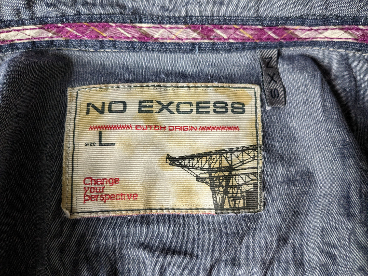 No excess shirt. Purple brown yellow checked with applications. Size L.